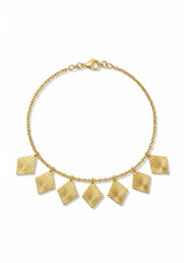 Pulsera dijes rombo dorados textura sunburst fondo blanco | Gheller Joyería